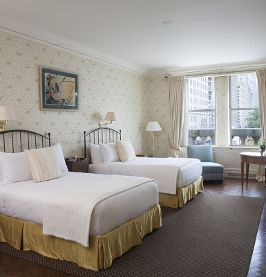 Two double beds are offered in one of the two bedrooms in the Park View Suite #301.
