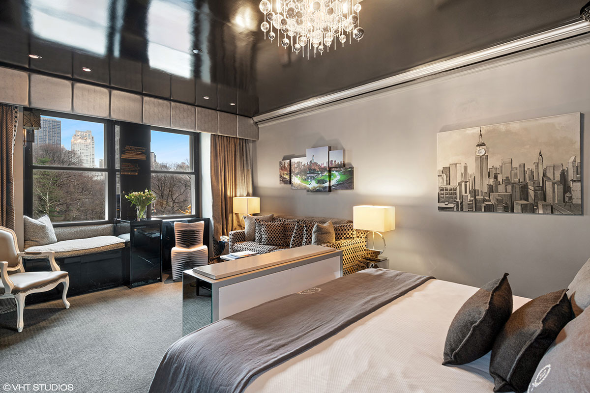 Elegant guest room at The Sherry-Netherland with Central Park view, custom furnishings, and neutral décor