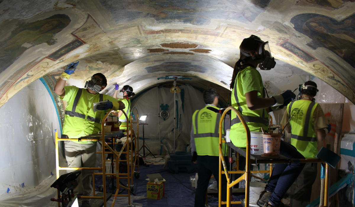 Conservation team restoring the hand-painted ceiling at The Sherry-Netherland in New York City